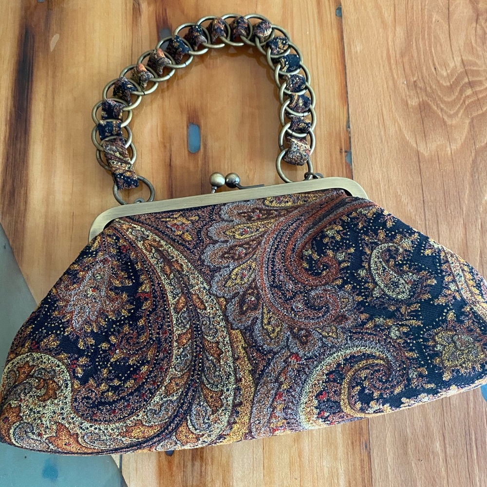 Vintage snap clutch